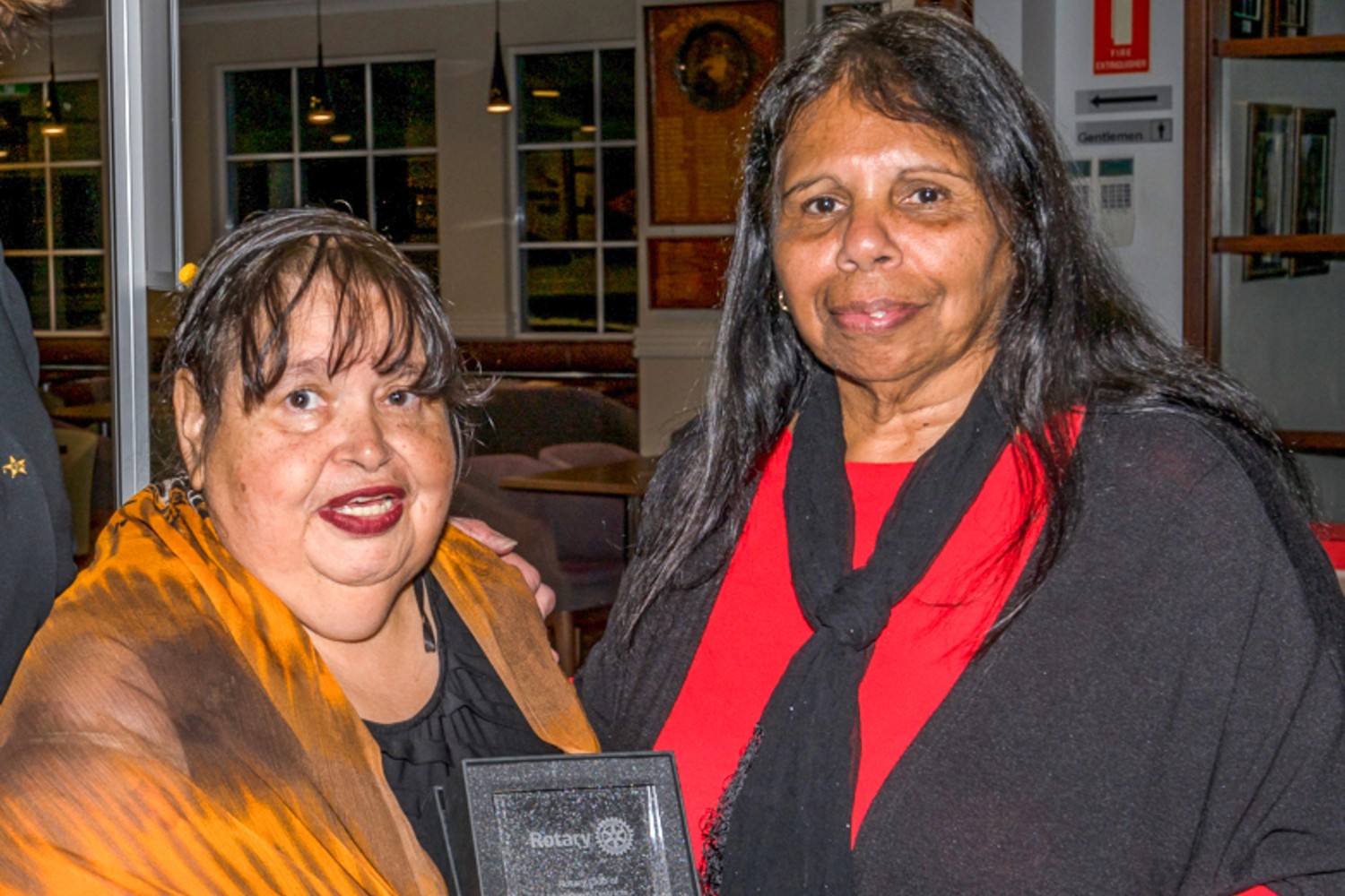 Customer and Aboriginal community icon Barbara recieving a Rotary Club Shine On Award